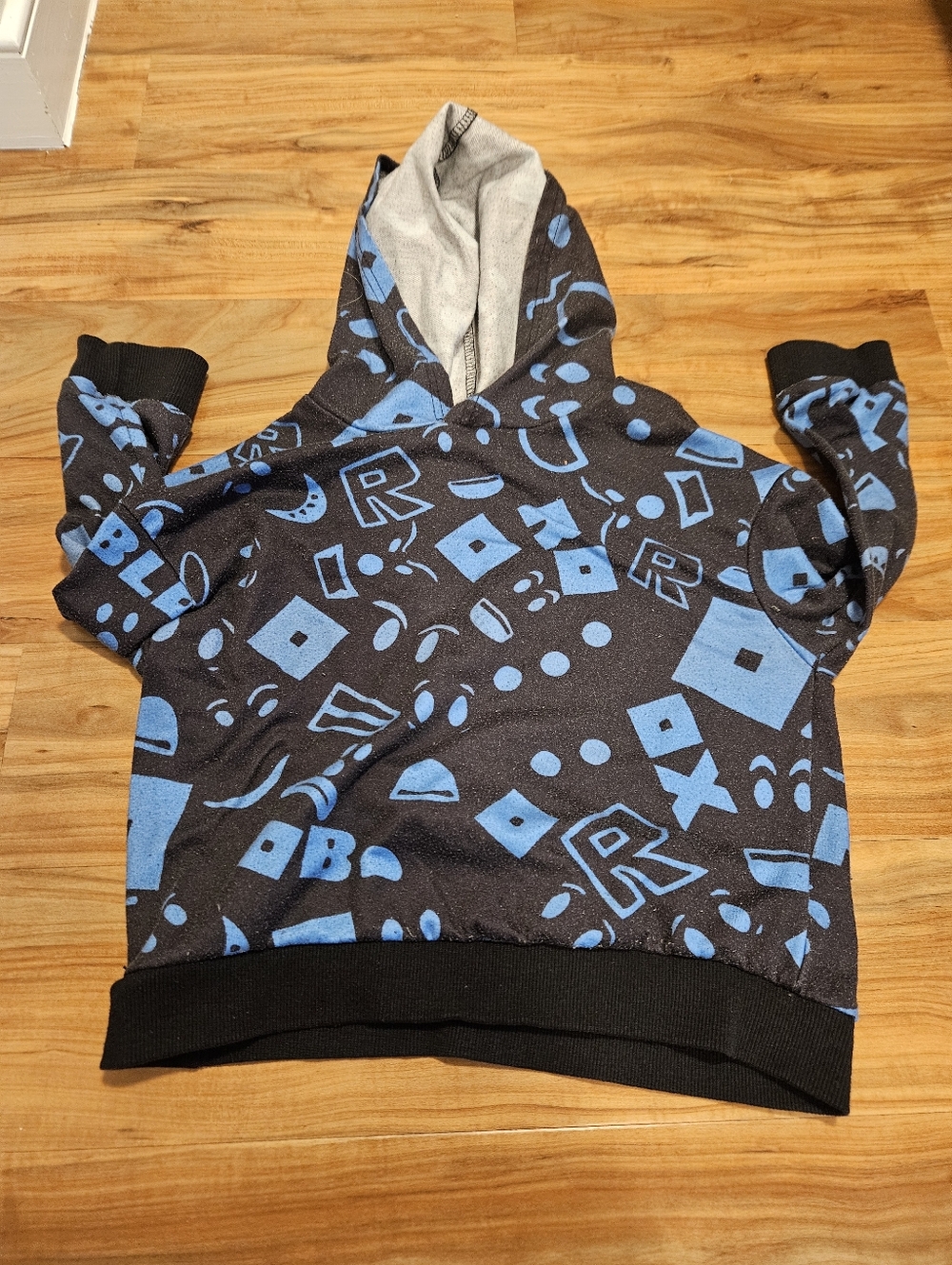 Black Hoodie Roblox with Blue Graphic Print 6 Years